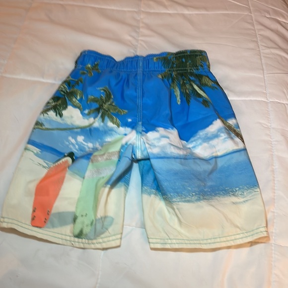 OshKosh boy’s swim trunks. Size 6. Island/surfboard print. - Picture 2 of 4